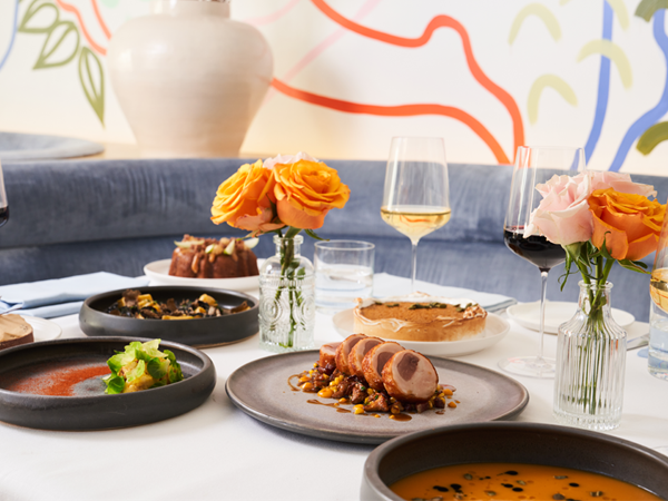 Festive dining spread on a white table cloth.