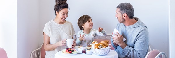 Family enjoying breakfast